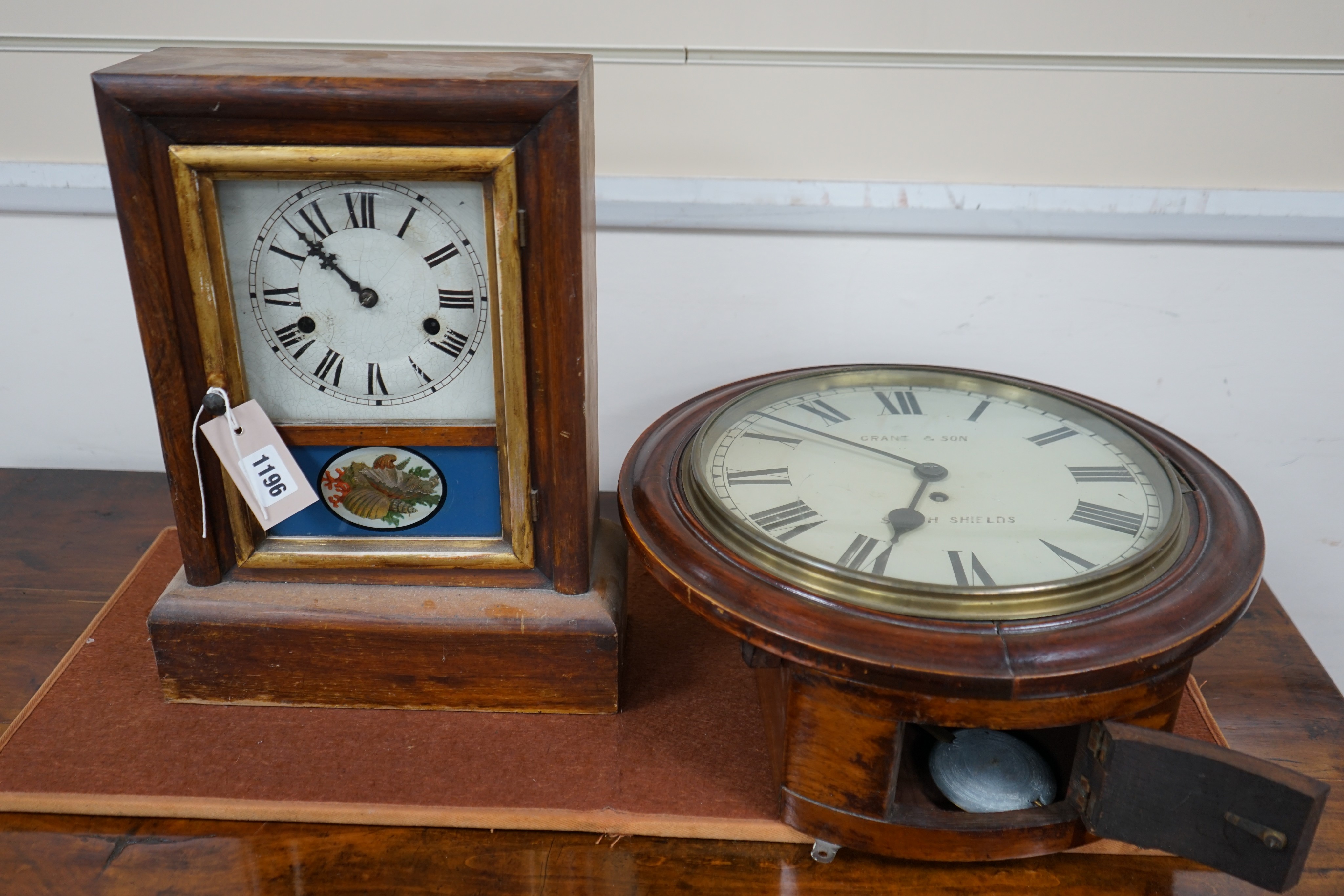 A Victorian mahogany circular wall dial with later movement, diameter 40cm together with an American shelf clock